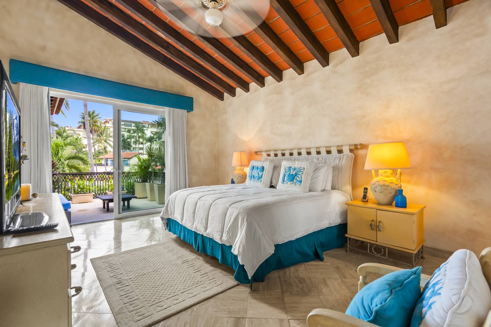 Bedroom suite with doors to a terrace over the gardens