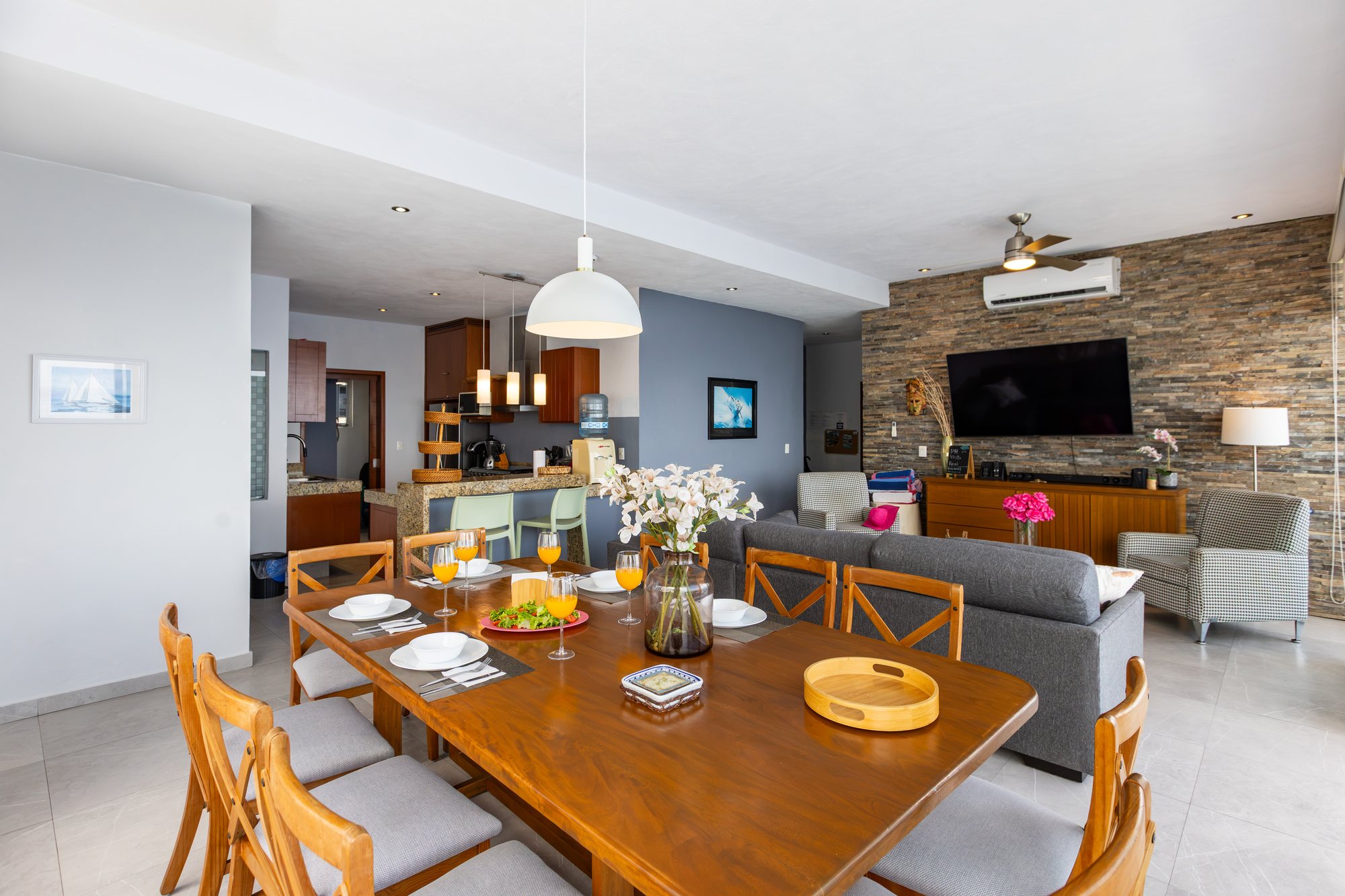 Dining table for eight beside the living room