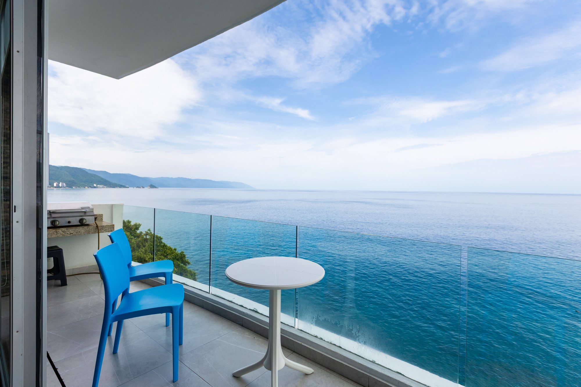 Bistro table on the balcony over the water