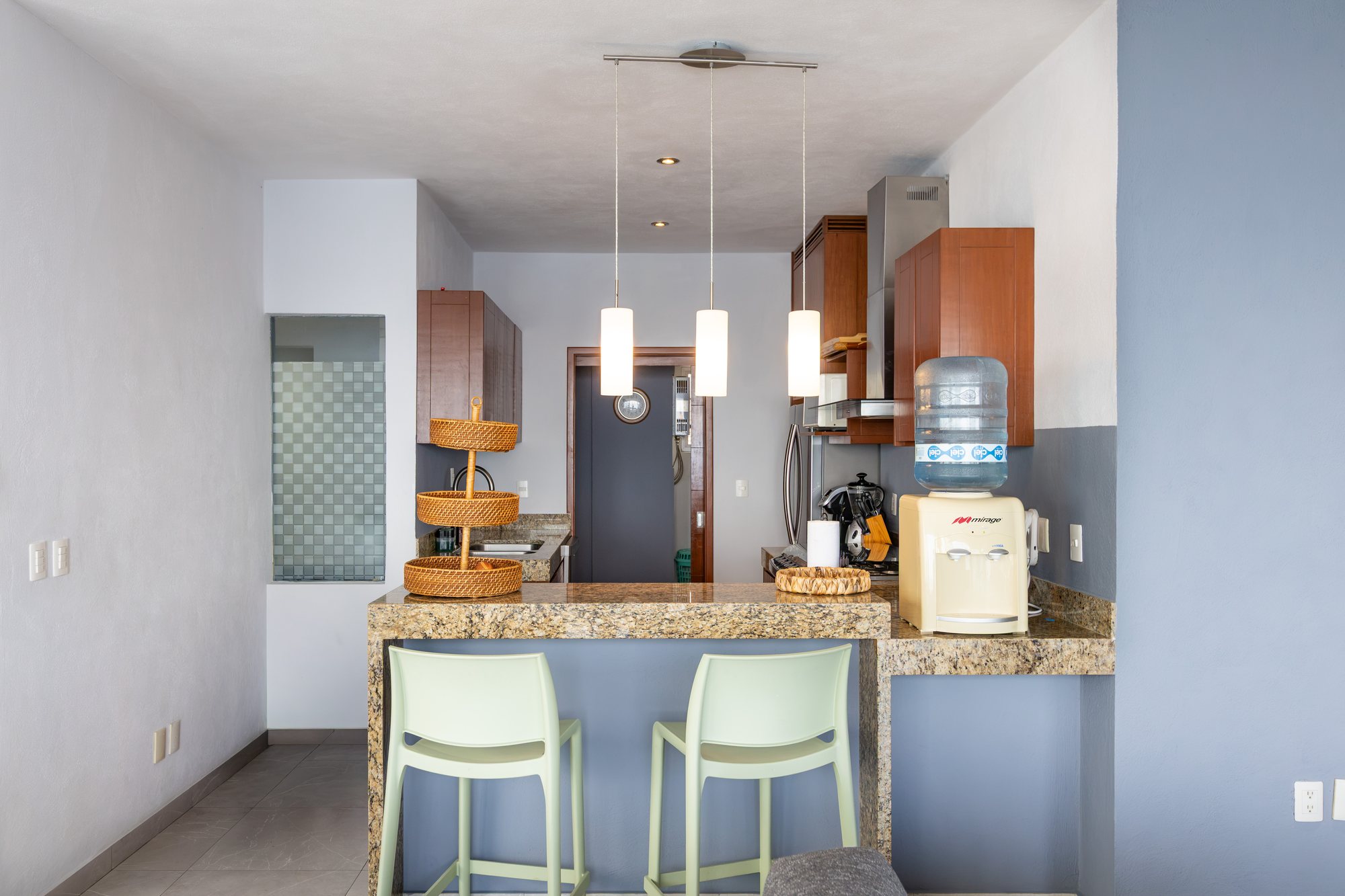 Kitchen breakfast bar with pendant lights