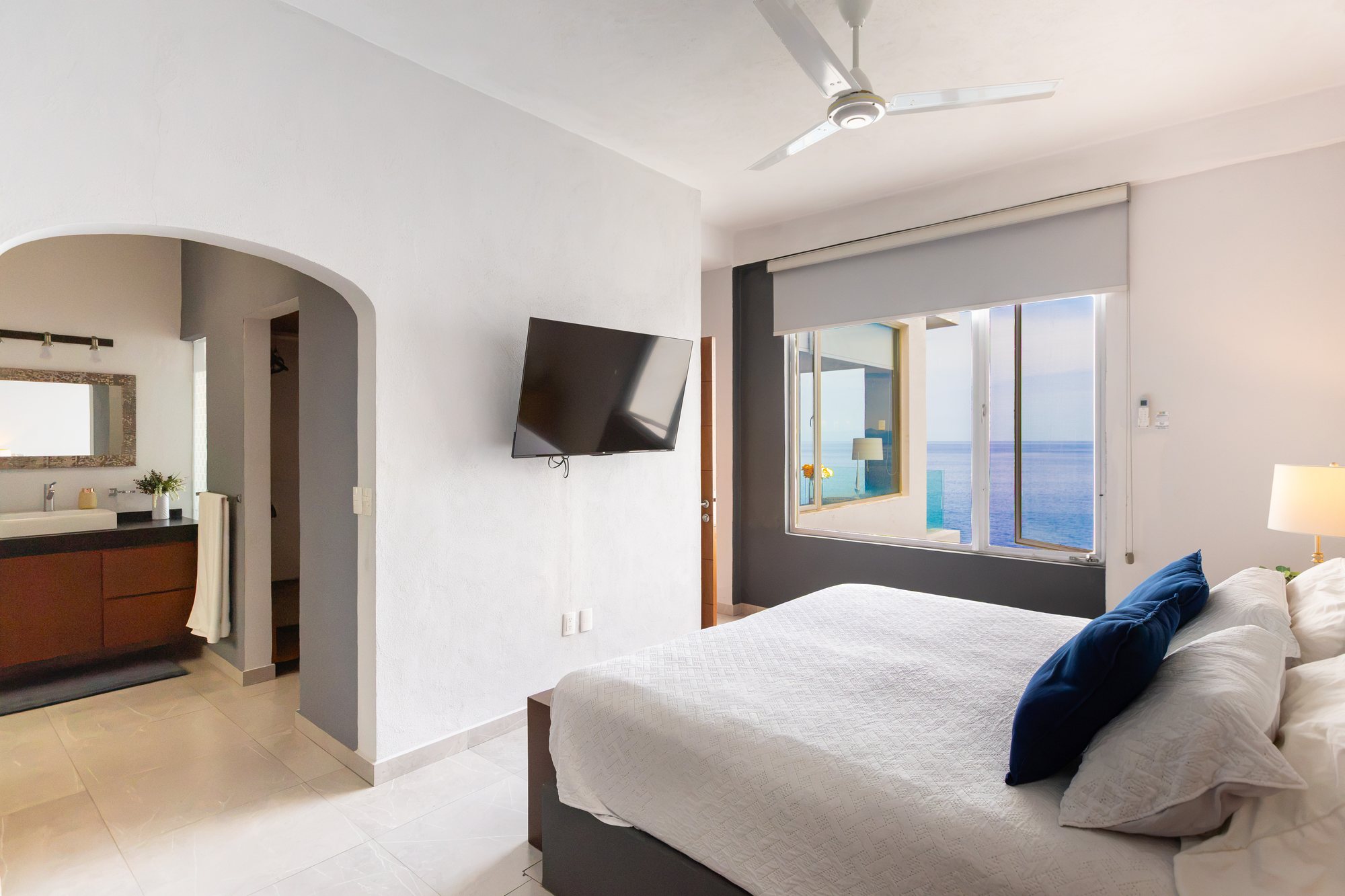 Bedroom with its own bath and a window on the bay
