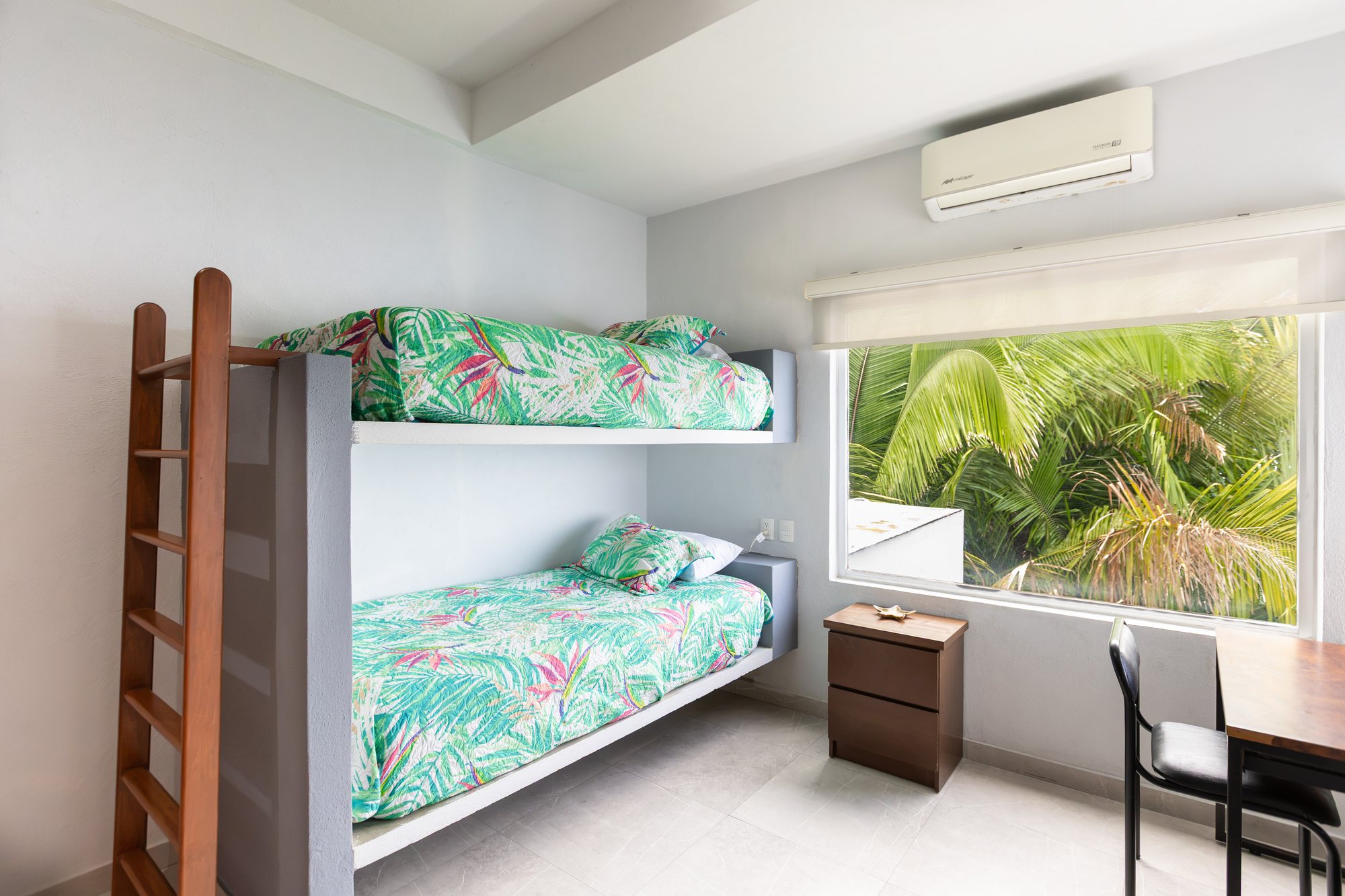 Bonus room with bunk beds and a garden window
