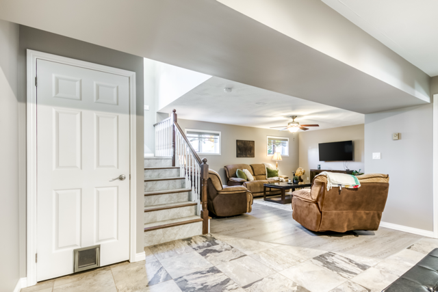 The lower-level landing and recreation room