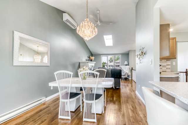 An open view from dining room to living room