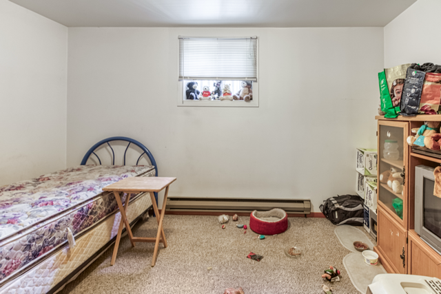 Bedroom in the main-floor apartment