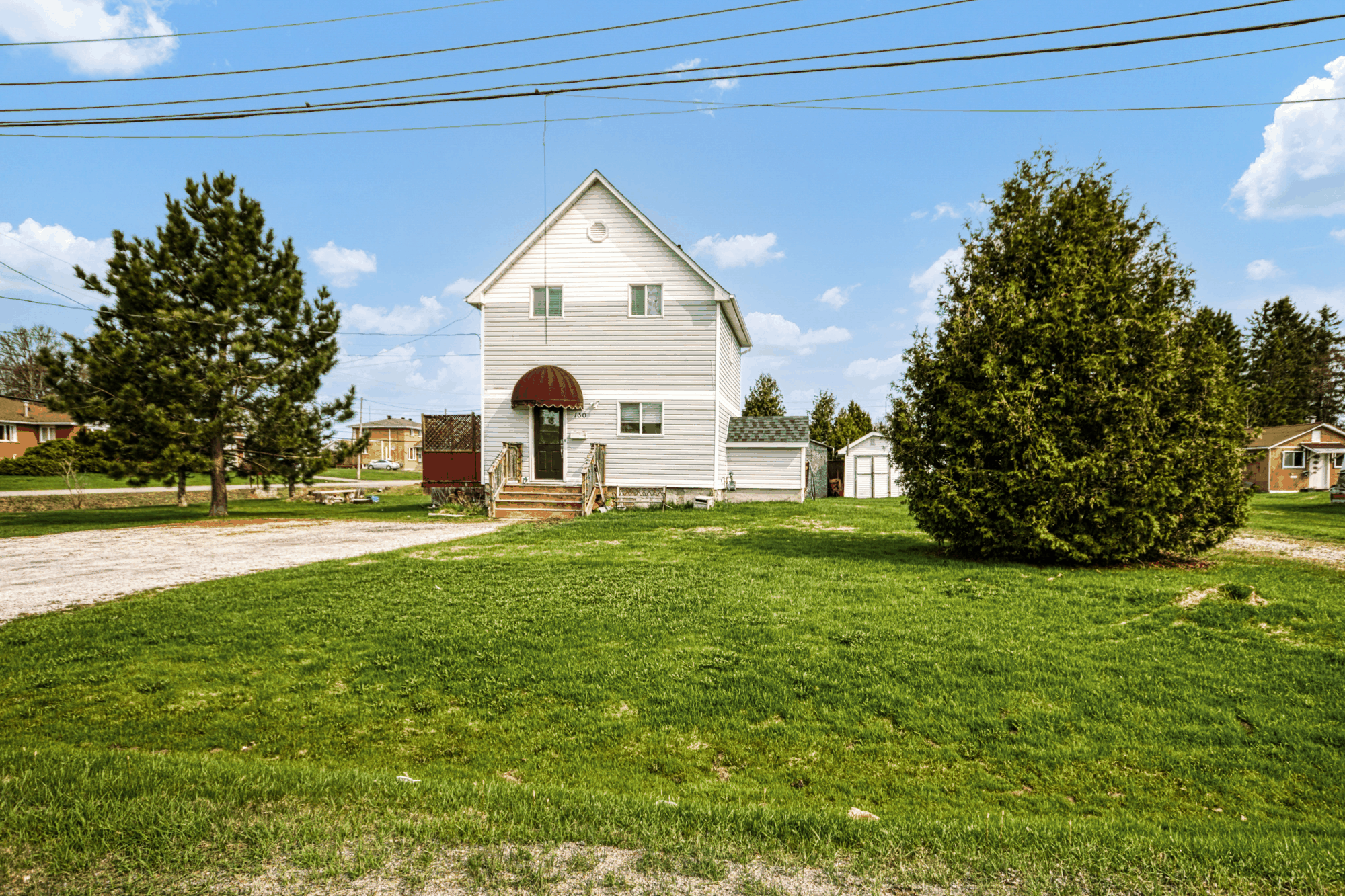 Front exterior and lawn at 130 Laurette Street