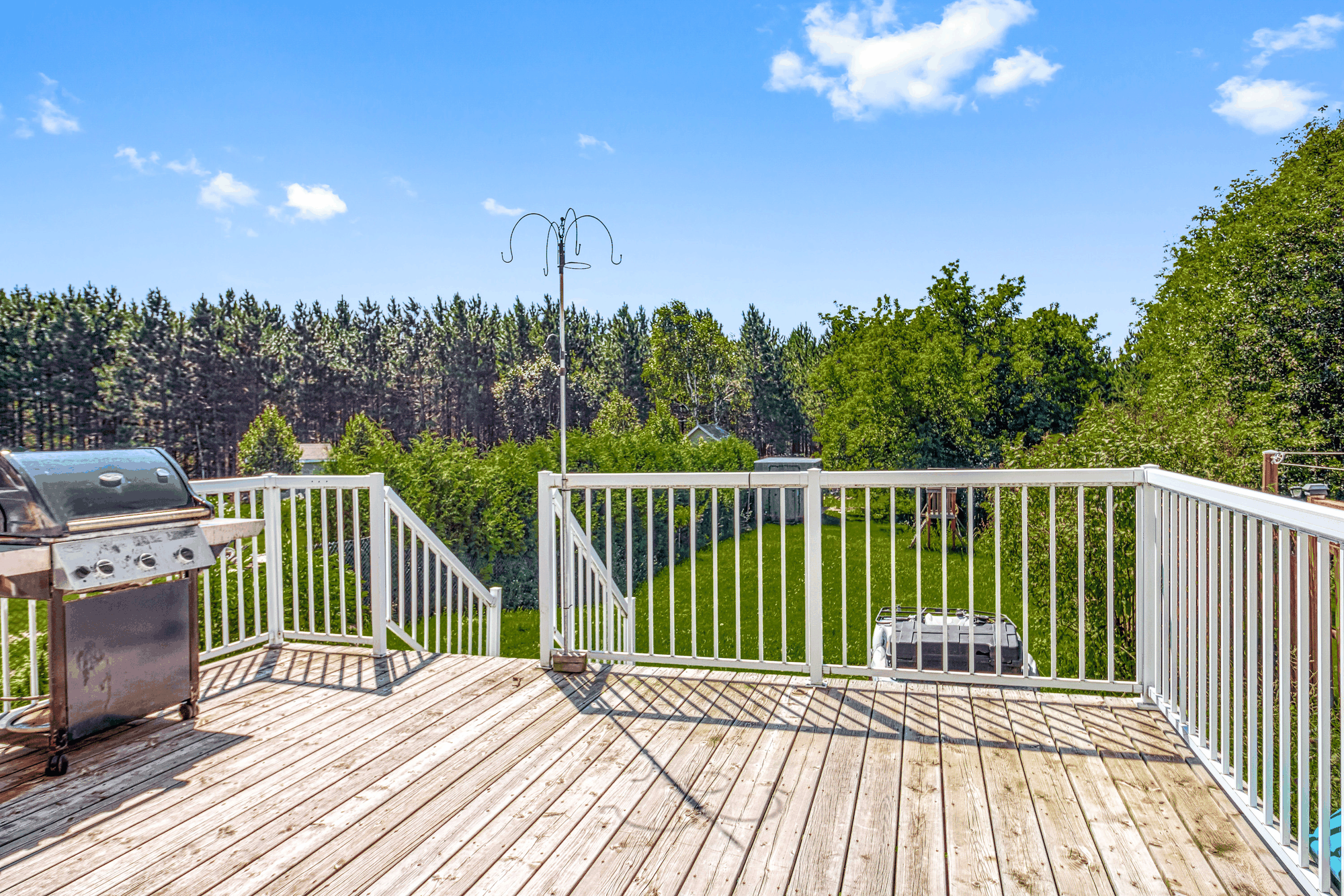 Rear deck overlooking the deep backyard
