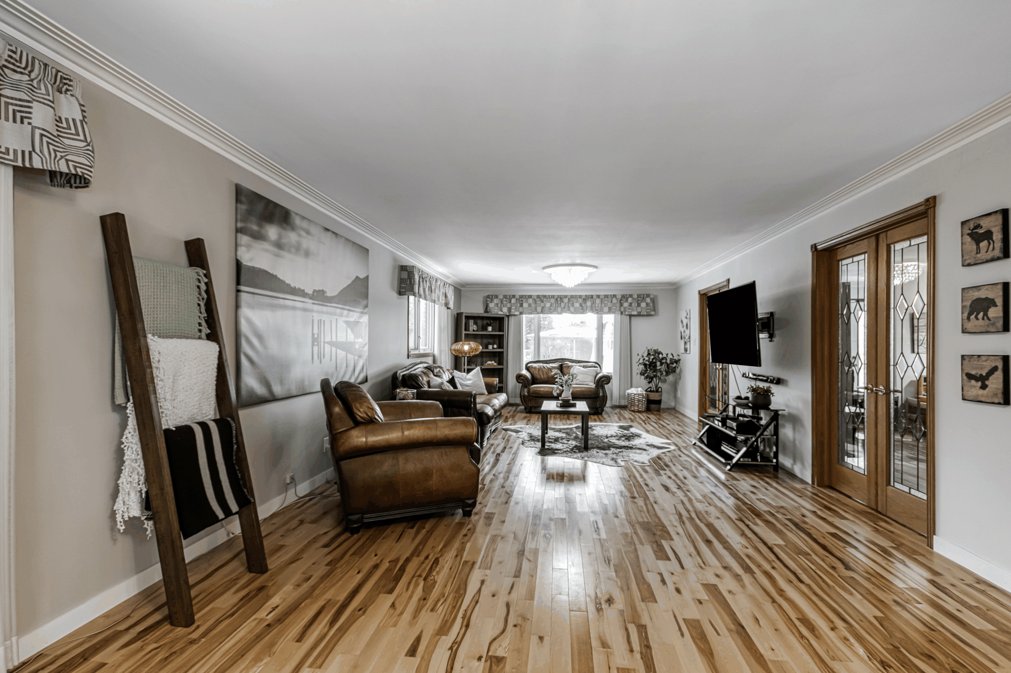 Open main-floor living and dining areas viewed from the kitchen