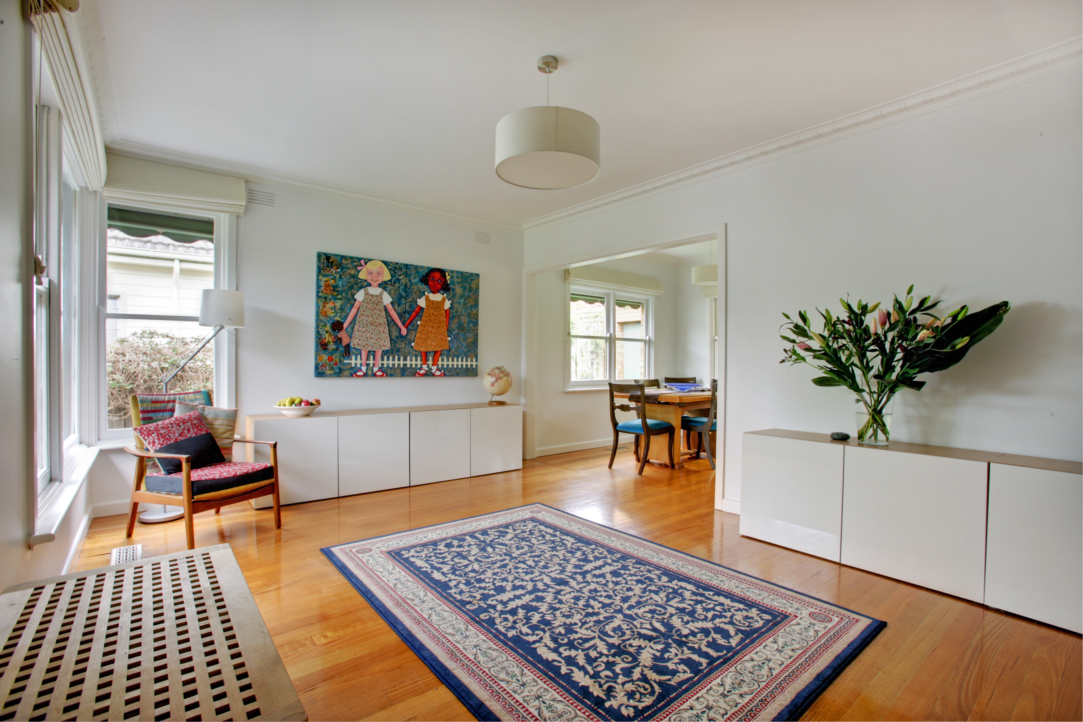 Bright, uncluttered living room ready for homebuyers to tour