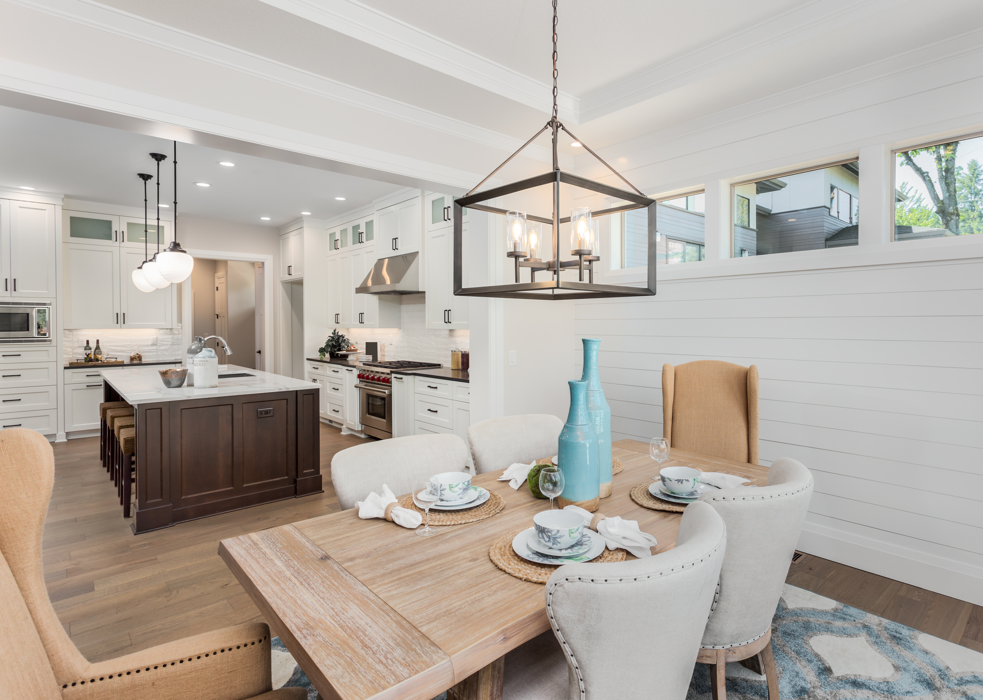A living room staged by Chatham Homes Realty in a house that is for sale