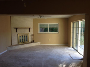 Family Room with cozy wood-burning fireplace