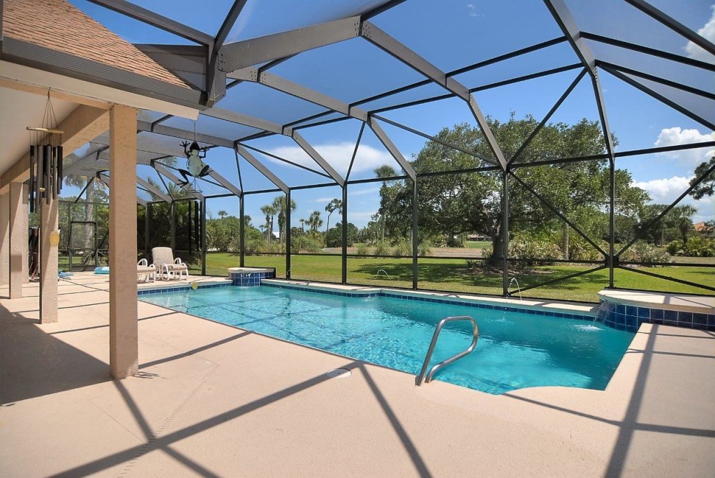 Covered Lanai and Pool with Golf Course Views!
