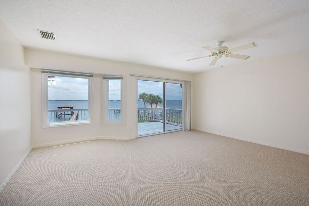 Master Bedroom with Private Balcony and River Views
