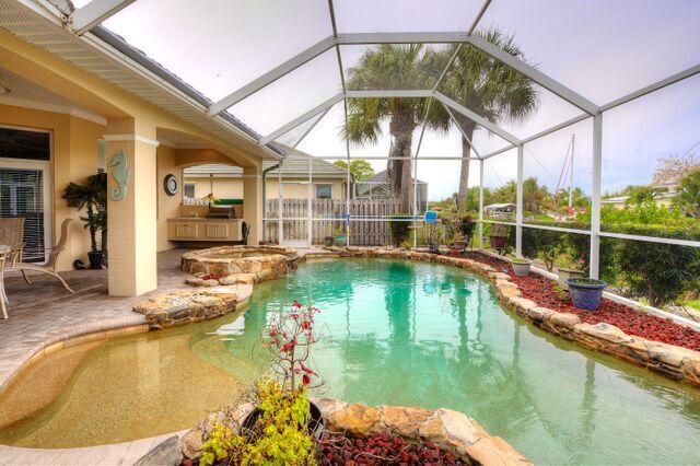 Covered Lanai with Summer Kitchen and Tropical Pool