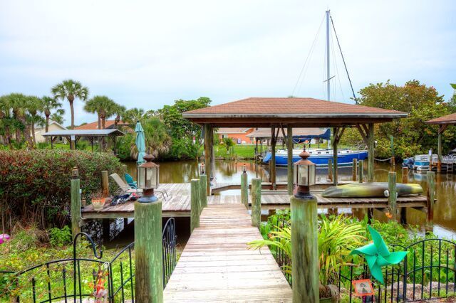 Private Dock with Boat Lift and Seating Area