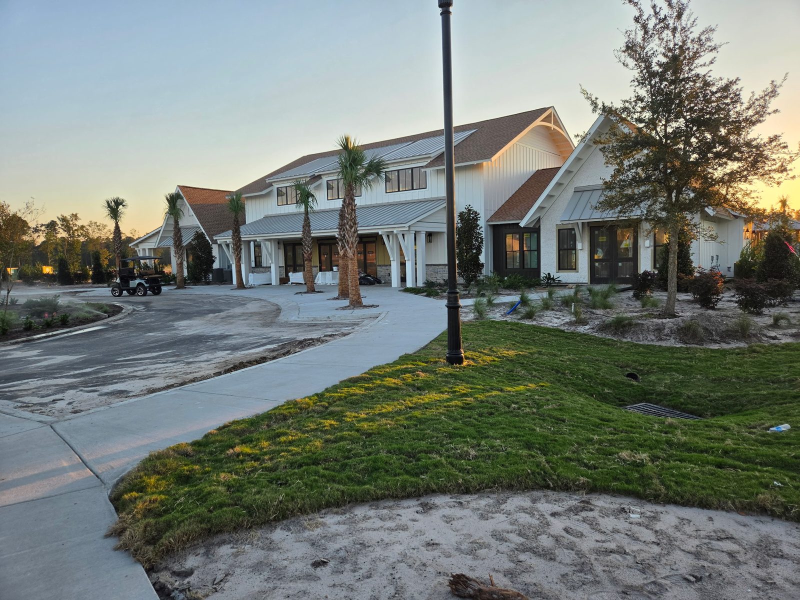 The Oasis clubhouse at Terrapin with new palms and landscaping, October 2026