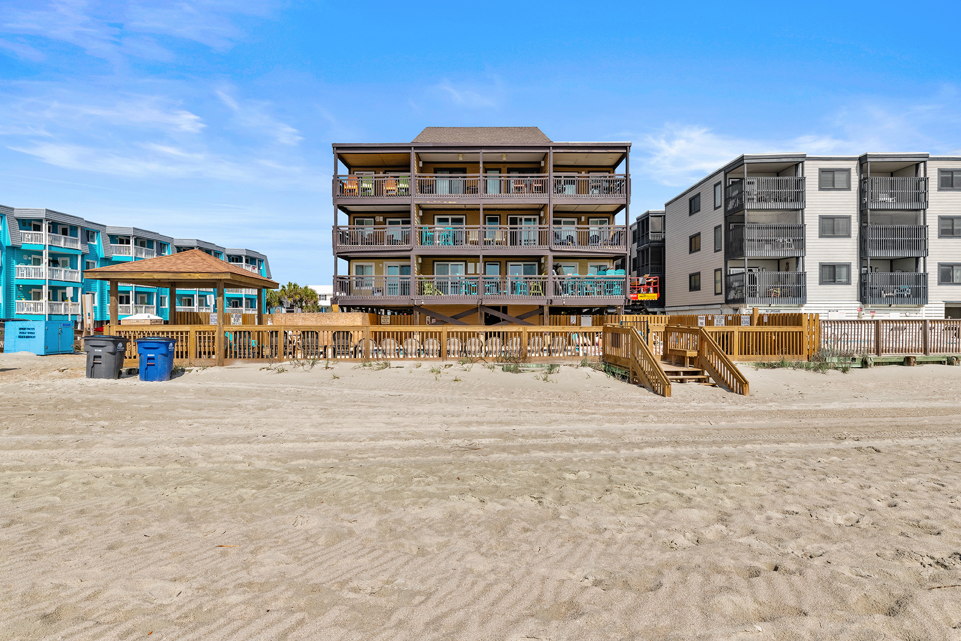 Oceanfront low-rise condominium building in Garden City, Murrells Inlet, South Carolina with direct beach access and panoramic Atlantic Ocean views.