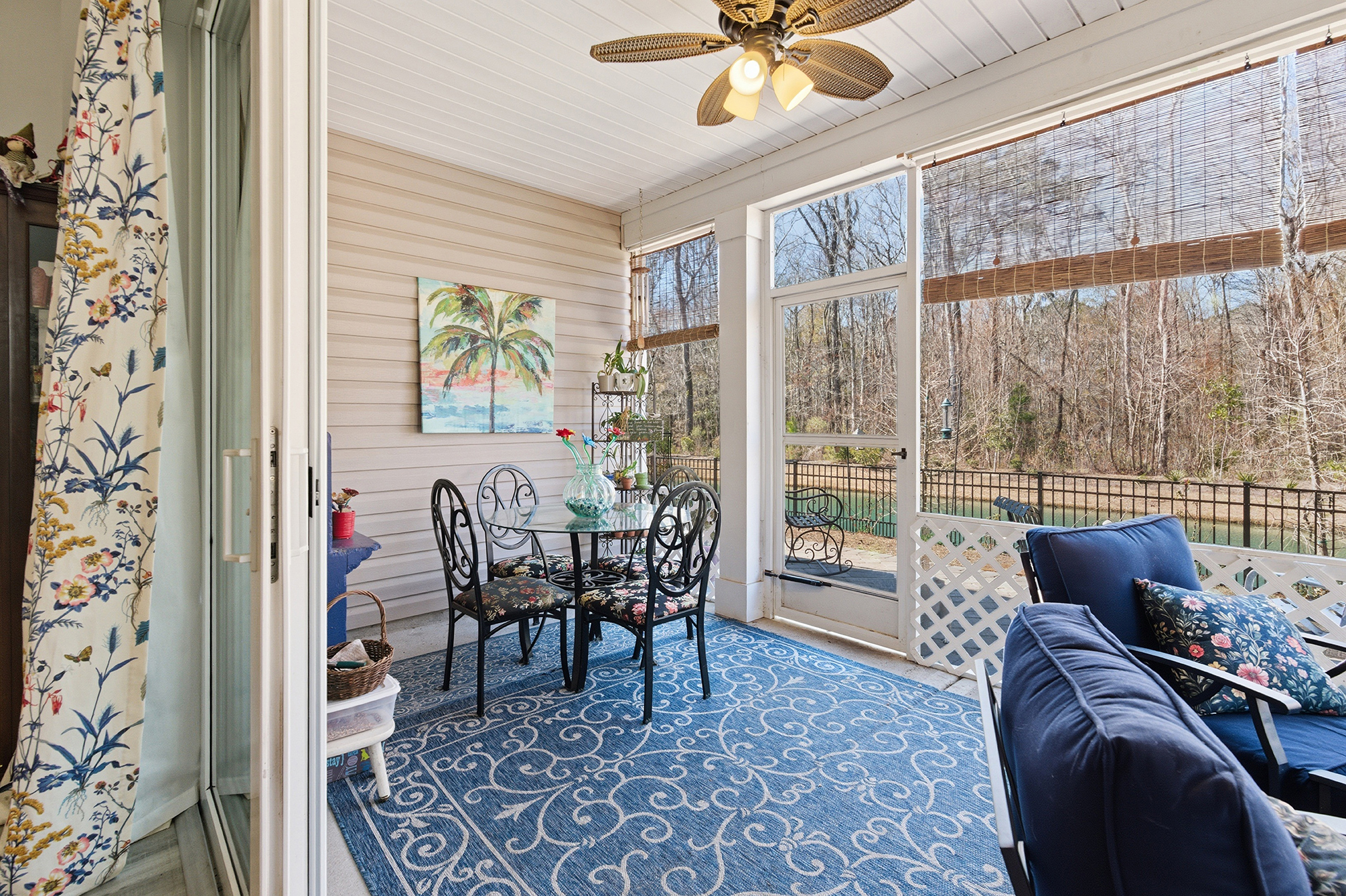 118 Rance Haven Dr Murrells Inlet screened porch with ceiling fan with view of the patio and pond