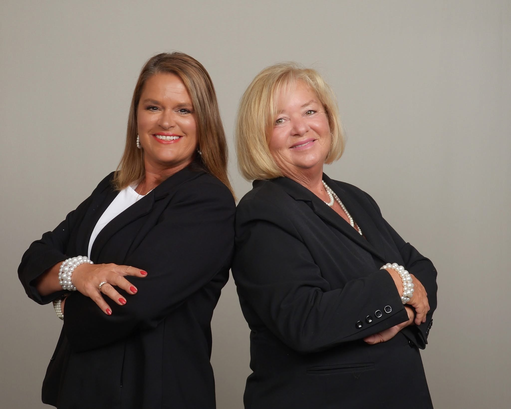 Tamara Moore and Robin Richardson of Coast to Country Group Realty, local real estate agents serving Garden City Beach, Surfside Beach, and the South Strand of South Carolina.