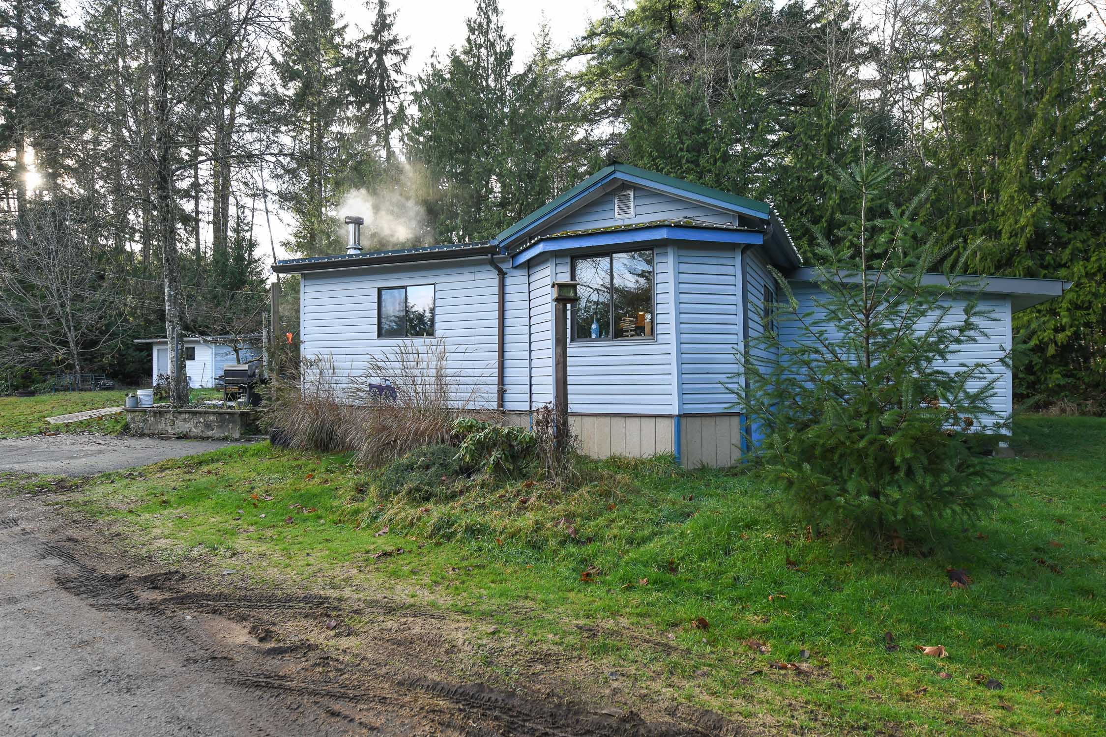 ru8 zoned 2.97 acre property featuring cozy home large outbuildings and viha approved meat processing facility with rural setting