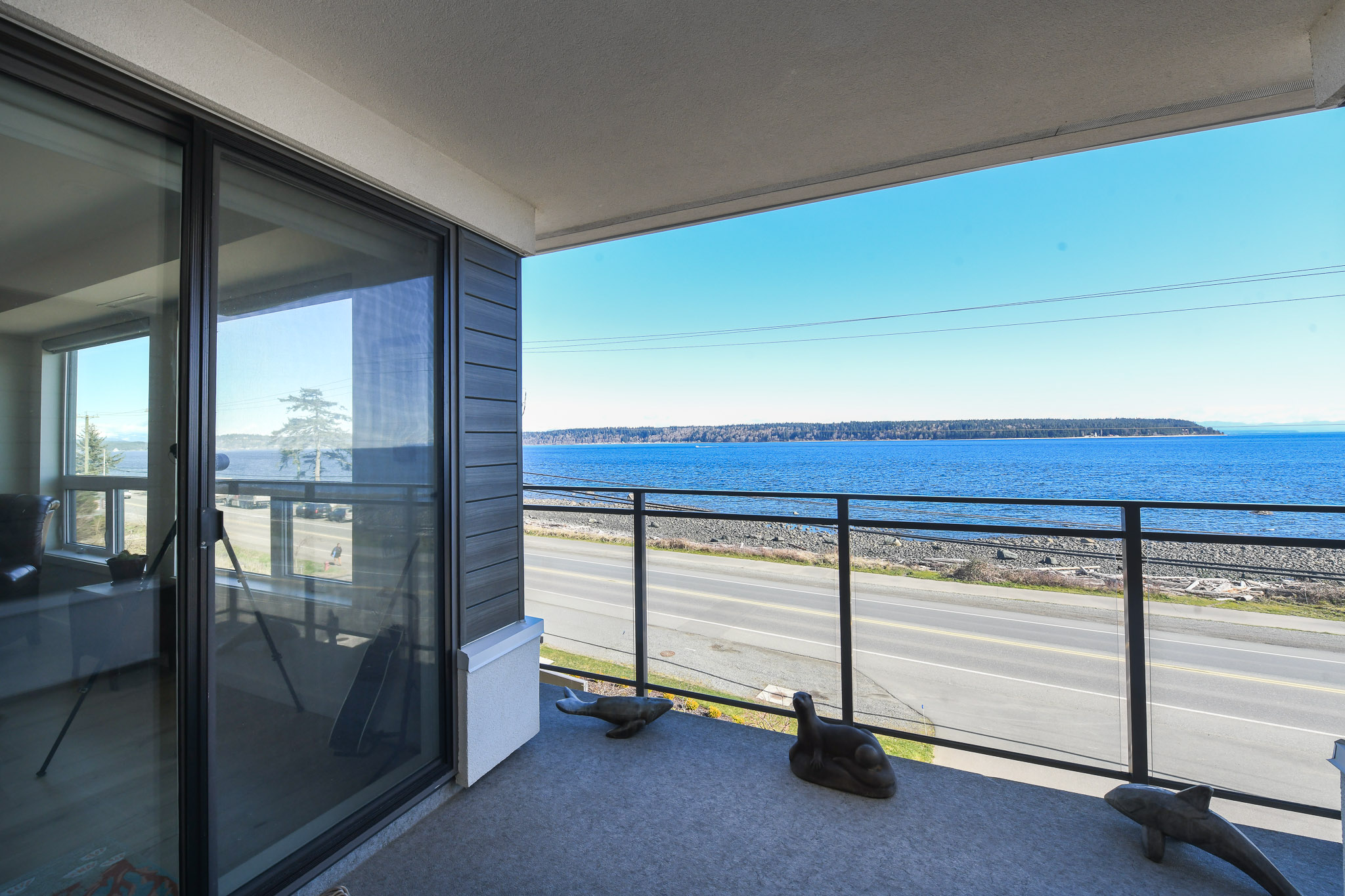 ocean and mountain view from 302 536 island hwy campbell river bc condo at omnia overlooking seawalk with private covered balcony