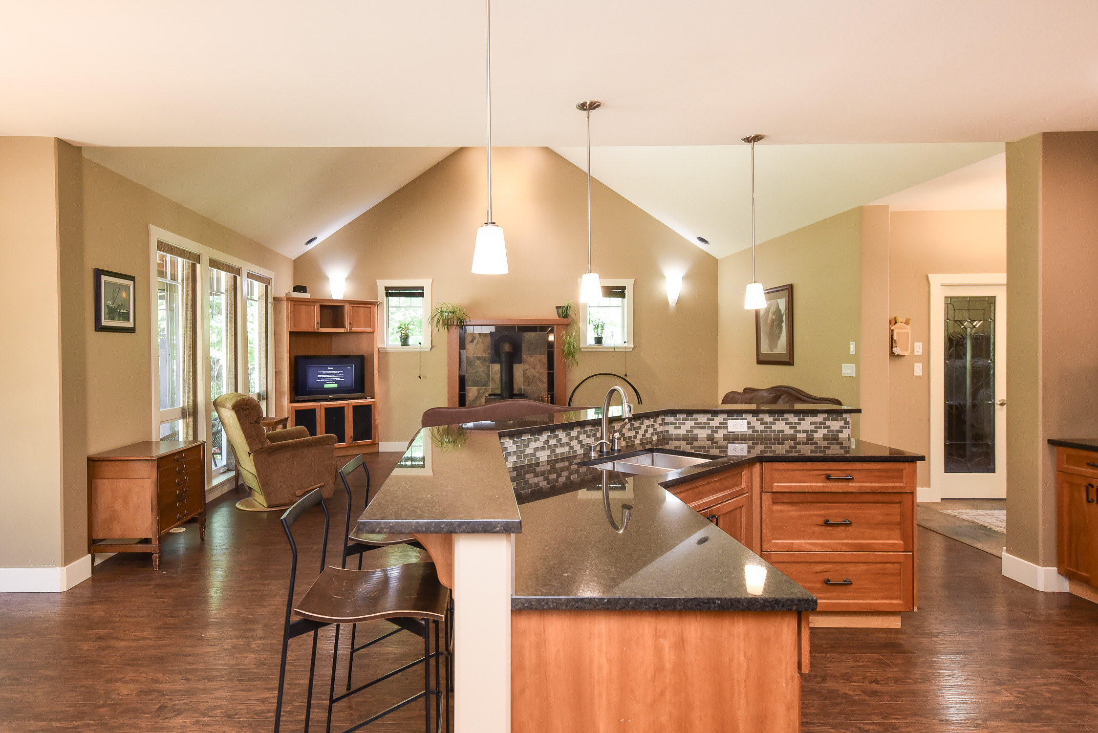 Beautiful 5-acre Courtenay property featuring two well-maintained homes, a large detached workshop, and lush private landscaping surrounded by mature trees &mdash; offering peaceful rural living with endless possibilities.