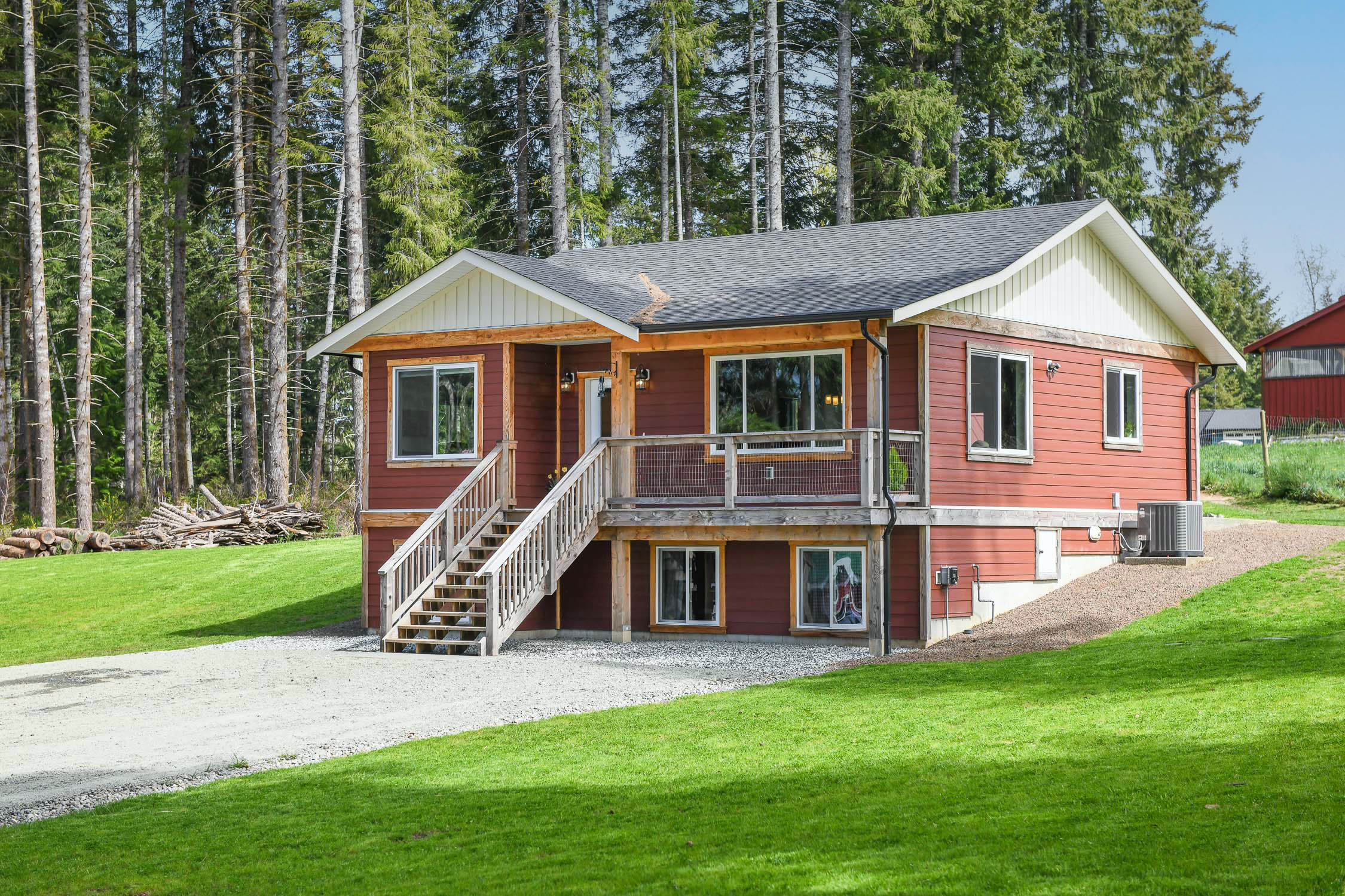 modern home at 7594 island hwy n courtenay bc on 1.95 acres with mountain views gardens and hobby farm features