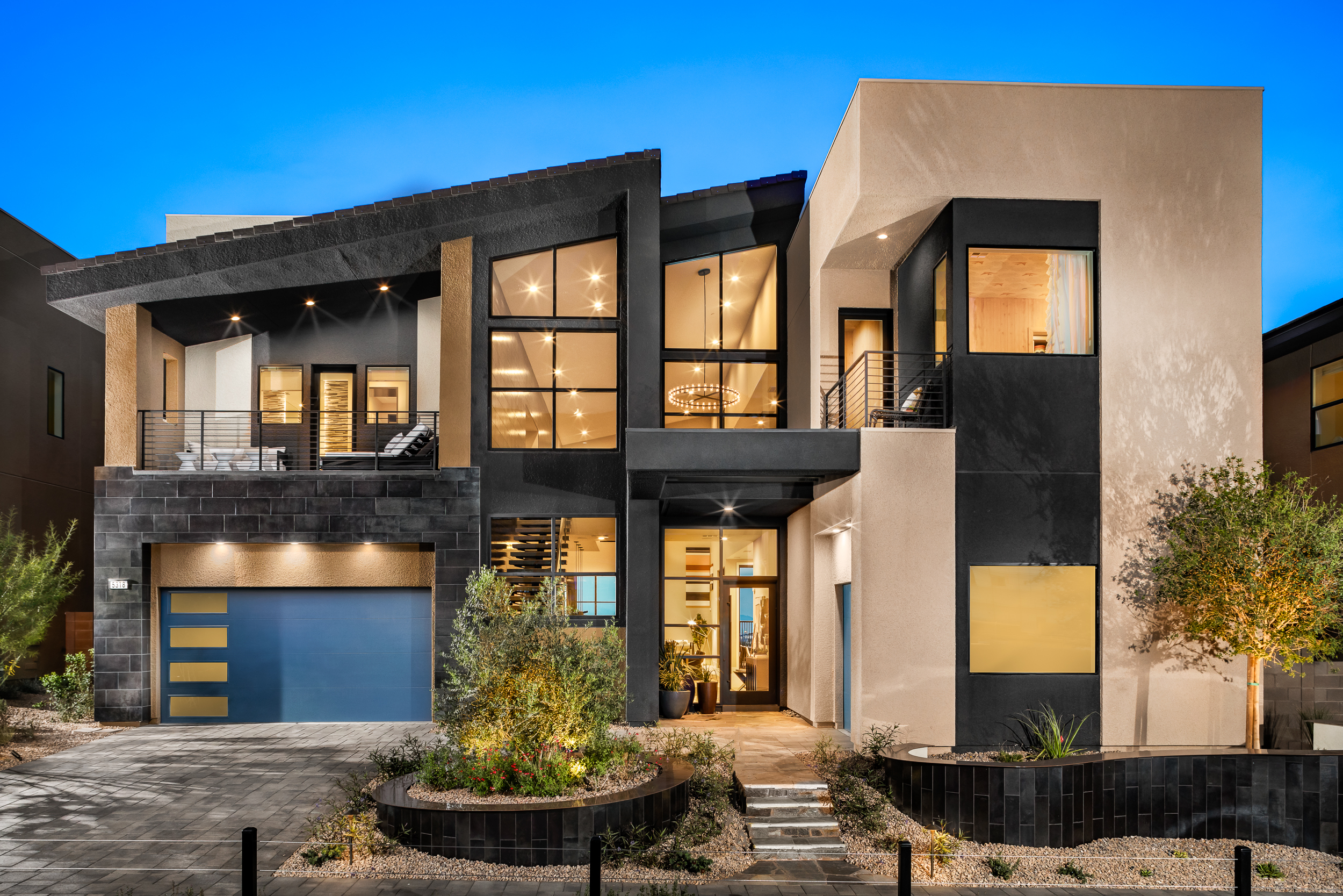 Front exterior of a modern home at Mesa Ridge Villages