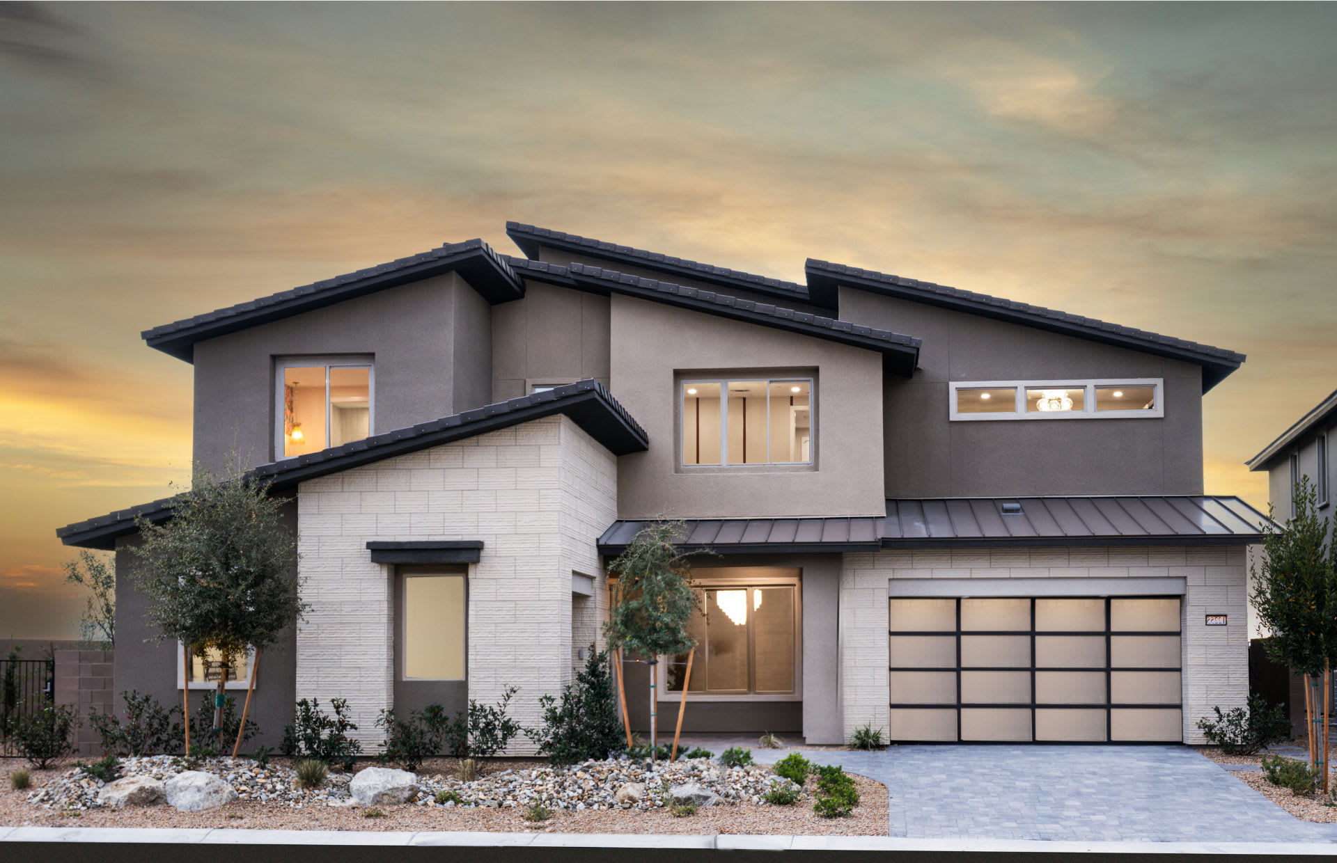 Two-story contemporary home at Brantley by Pulte at sunset