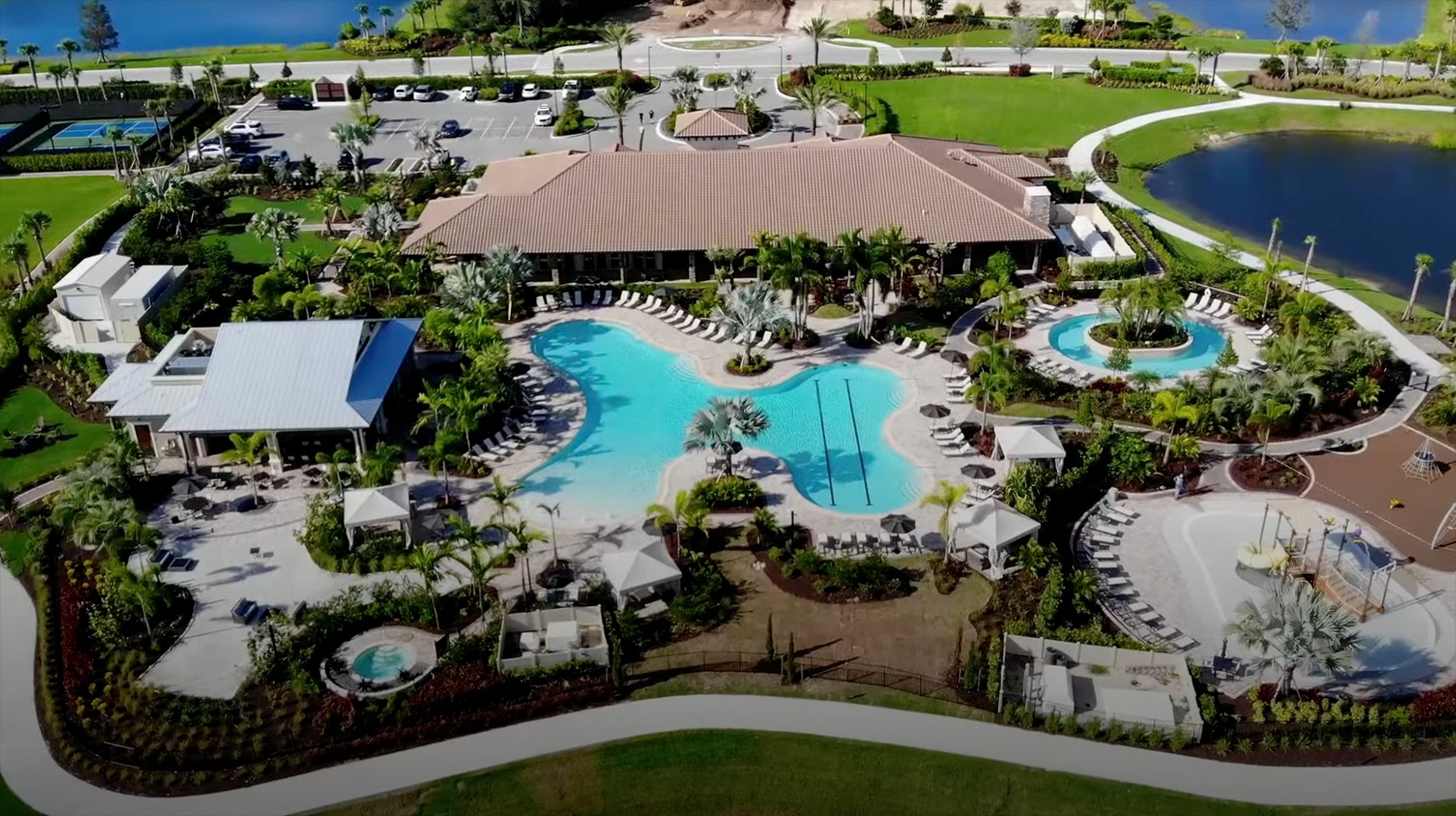 Aerial view of the resort-style pool and clubhouse at Esplanade at Red Rock by Taylor Morrison