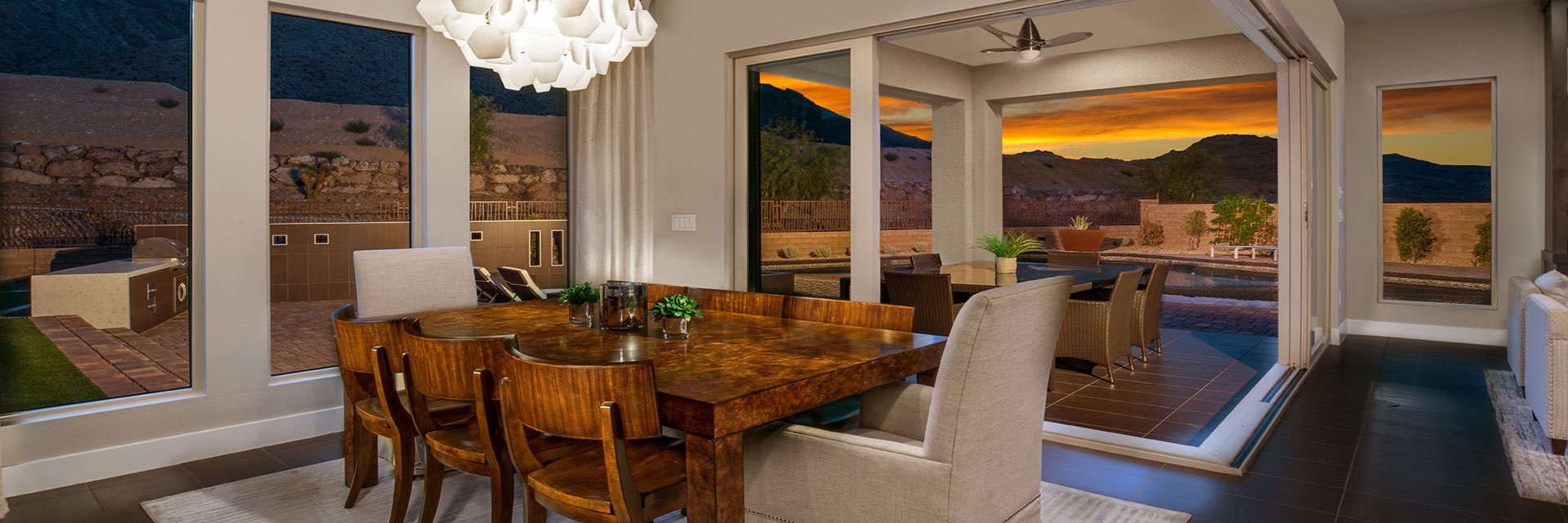 Café dining area with mountain views at Reverence by Pulte