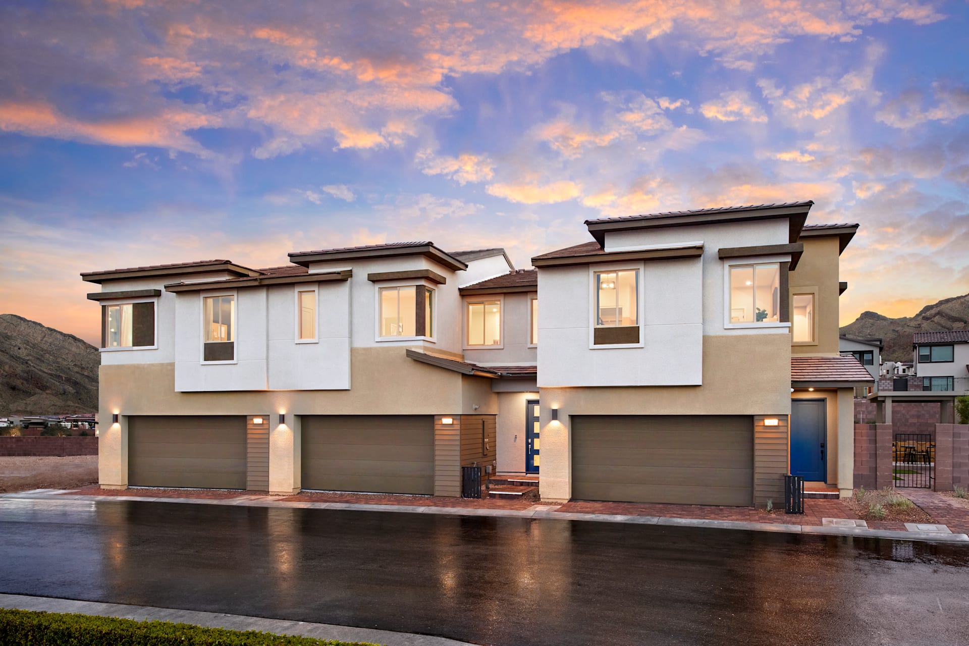 Two-story homes at Vertex by Tri Pointe Homes at dusk