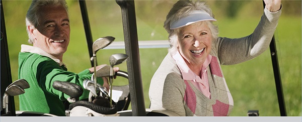 The Villas at Green Valley Ranch Golf Course Cart Couple Enjoying a round of golf 
