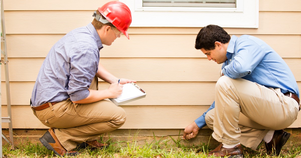 Home inspection, inspector checking foundation