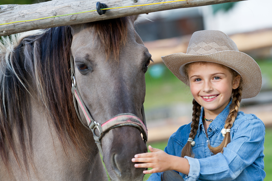 Cave Creek real estate owners go horseback riding near Cave Creek homes.