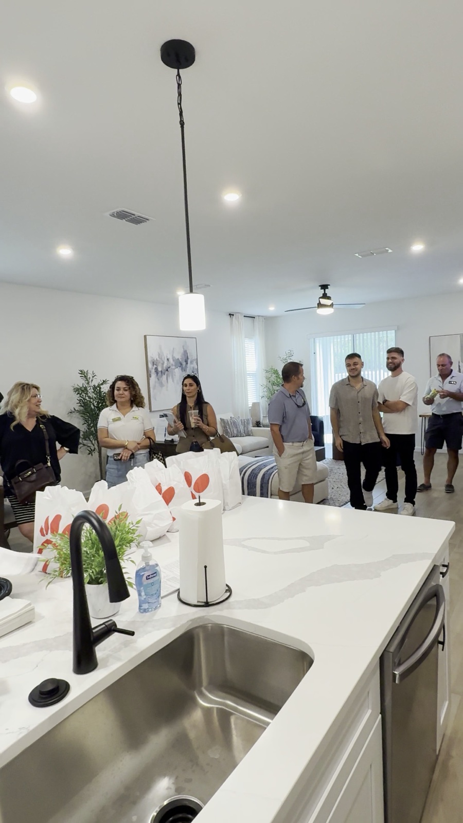Agents at the INB Homes Palm Coast model