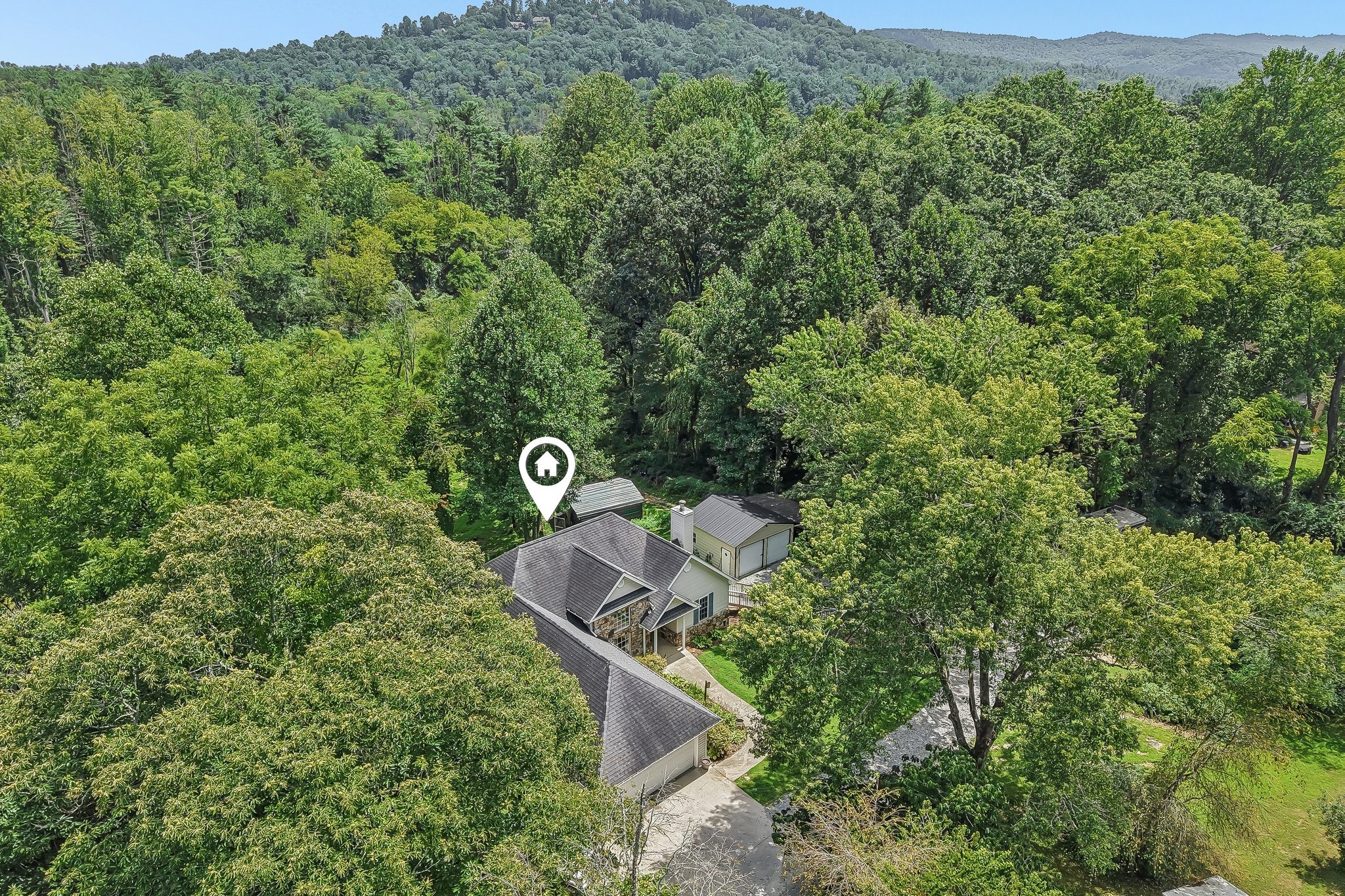 Aerial view of 1414 Kanuga Road in Hendersonville NC on 3.30 acres
