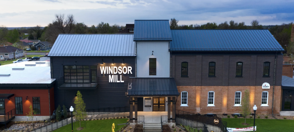 The historic Windsor Mill building at dusk