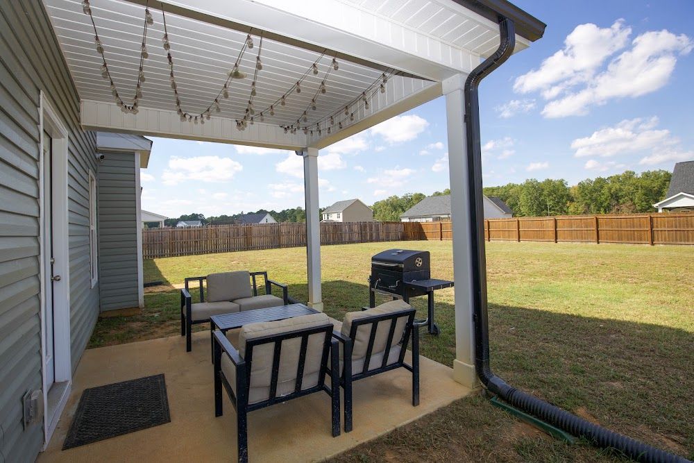 Covered rear patio at 221 Vega Lane