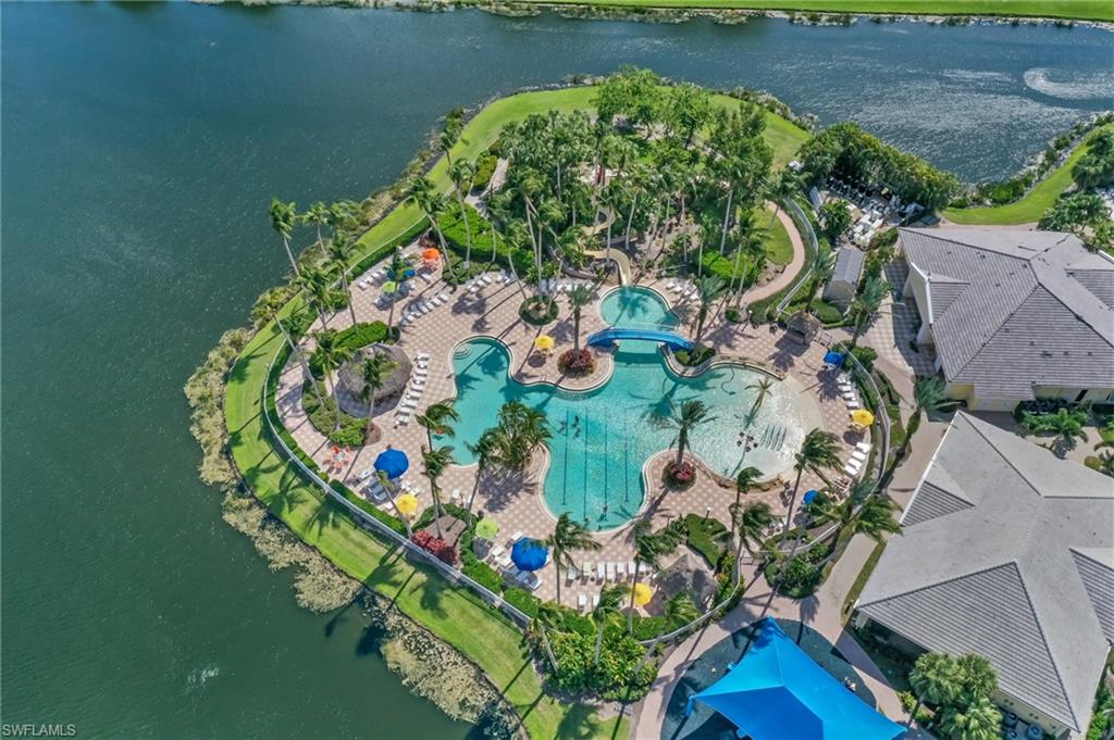 An aerial view of the Sandoval neighborhood in Cape Coral showcases a well-planned layout of residential streets and various home types, highlighting the community's resort-style amenities and large corner lots. This image provides a glimpse into the Sandoval real estate market, where prospective properties are available for sale, offering potential buyers the opportunity to find their dream home.