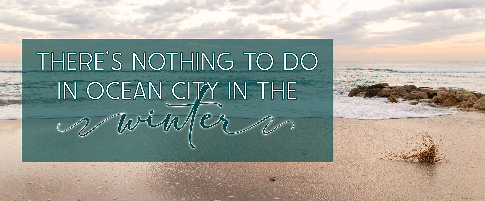 Winter beach in Ocean City with soft waves and pale skies, used as a graphic for the article about the myth that there&rsquo;s nothing to do in Ocean City in winter.