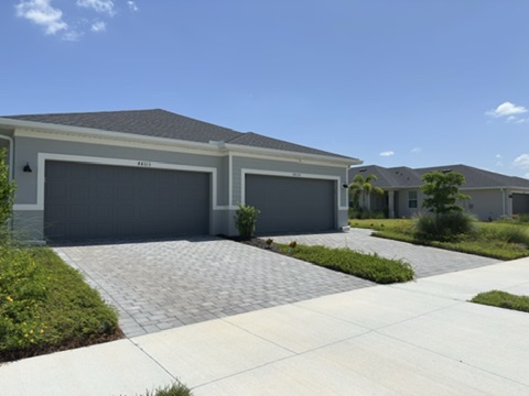 Attached villas along a Tucker's Cove streetscape