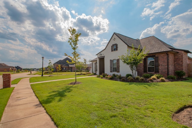 Selling a home in Utah with a brick exterior and green landscaping