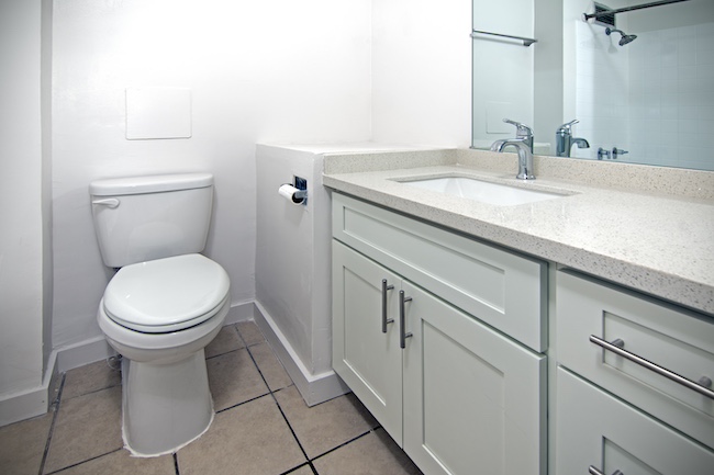 Remodeled Bathroom in Makaha with Quartz Countertops