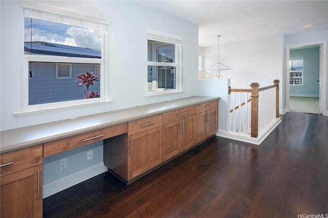Upstairs Office Space and Chandelier Above the Stairs