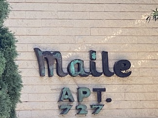 Maile Apts Sign