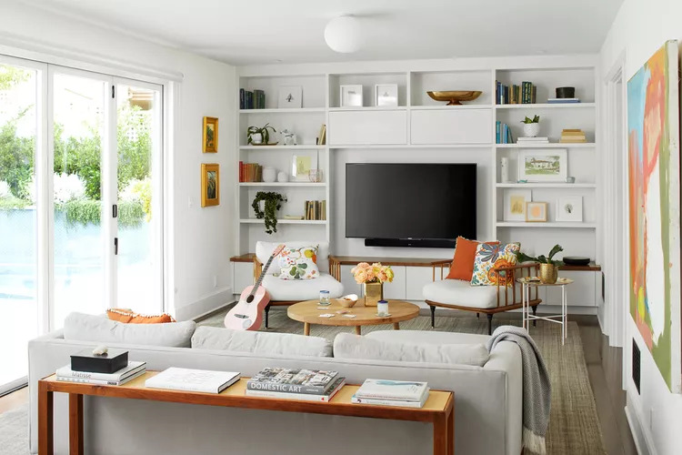 A living room with a tv and a couch