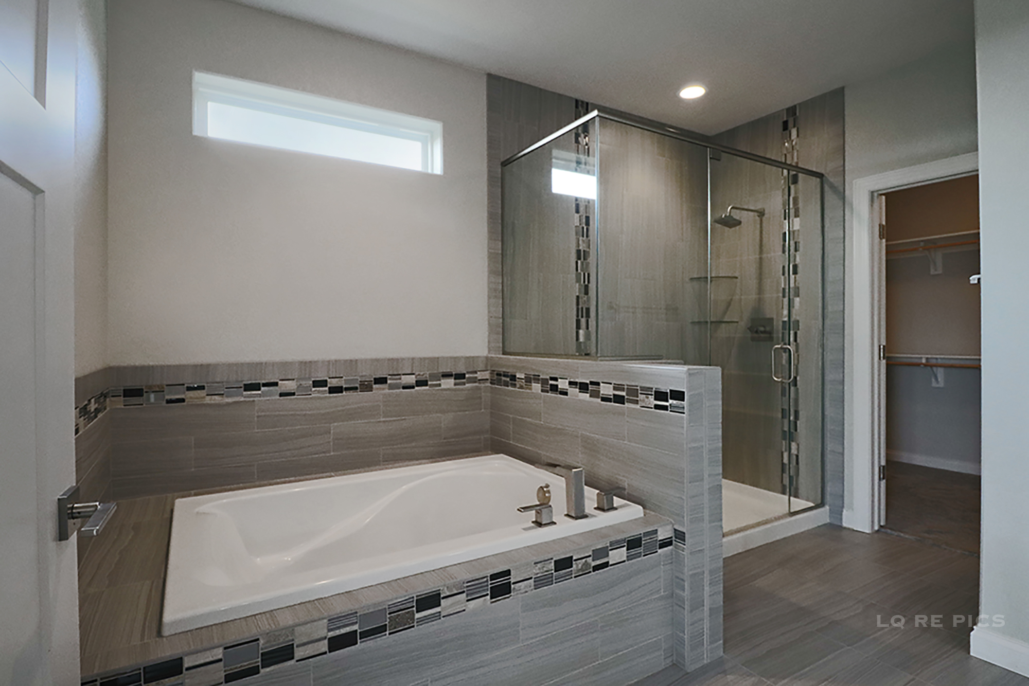 Tub and shower in bathroom