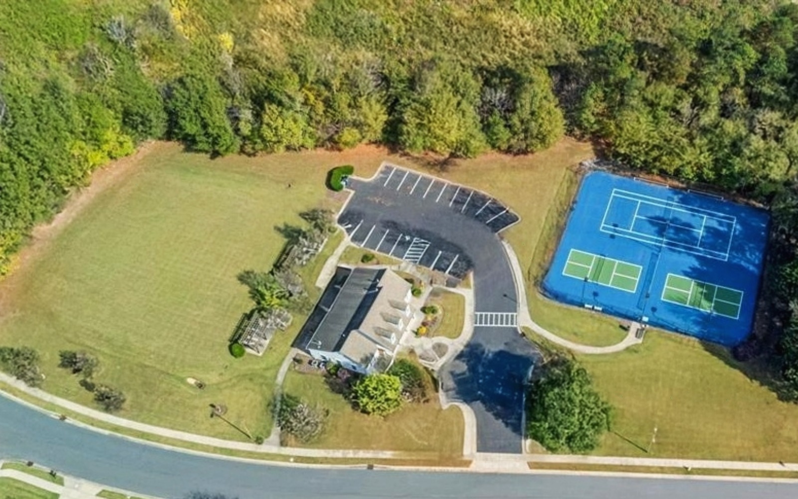 Highland Creek recreation field clubhouse and sports courts