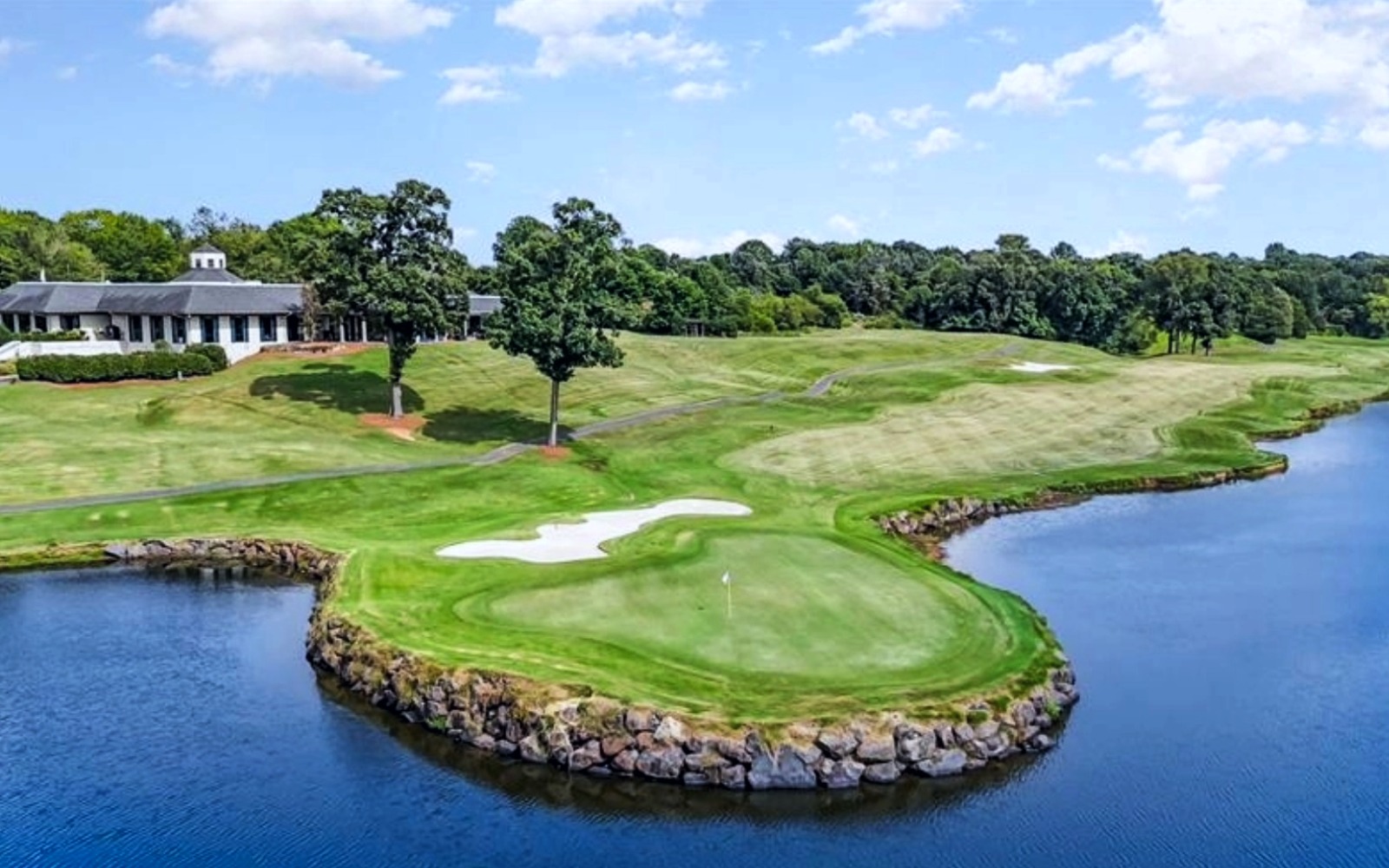 Back of TPC Piper Glen clubhouse overlooking the golf course